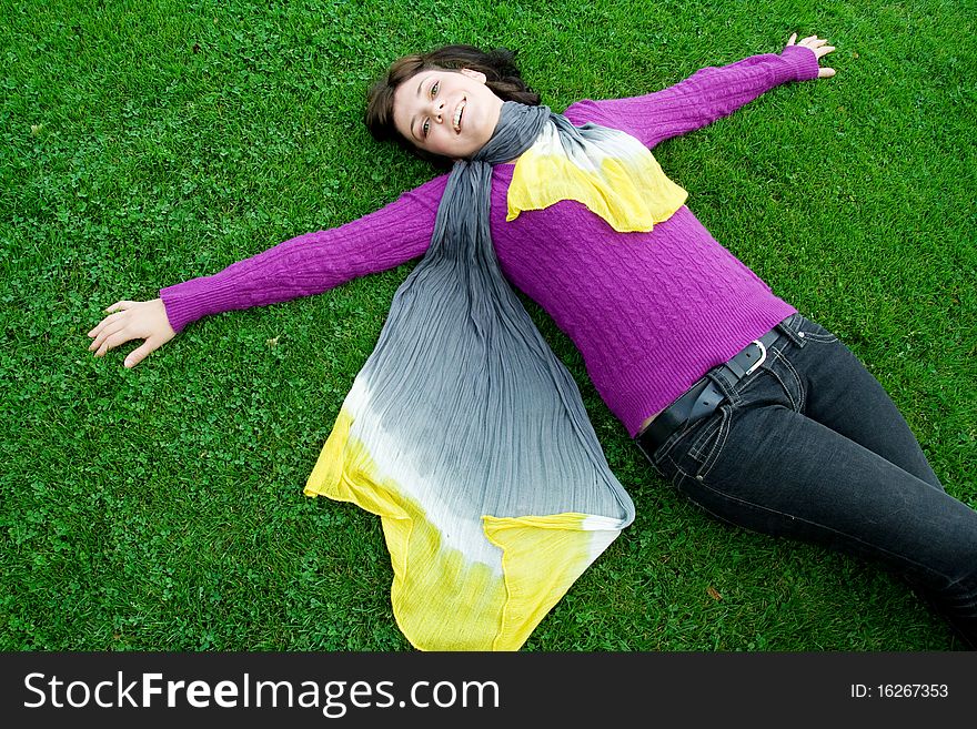 Beautiful green eyes natural girl on grass