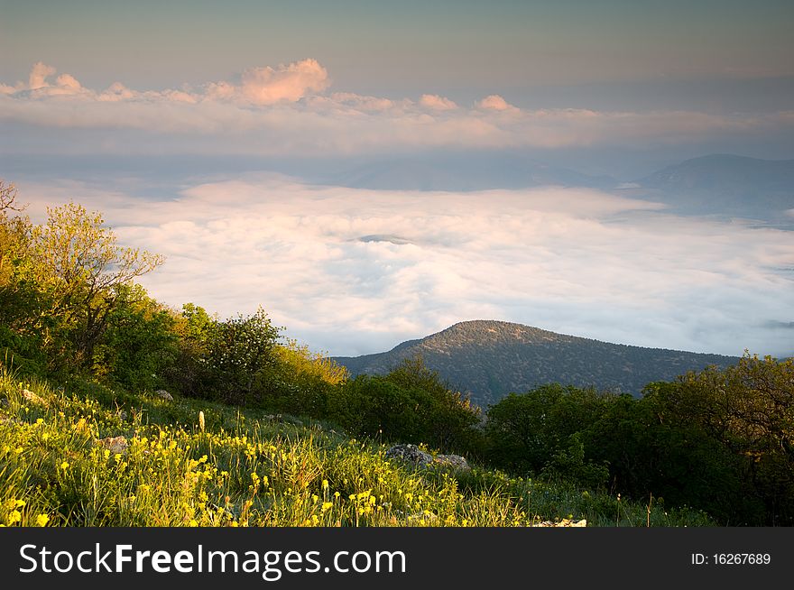 Mountain landscape with view of dramatic sunset