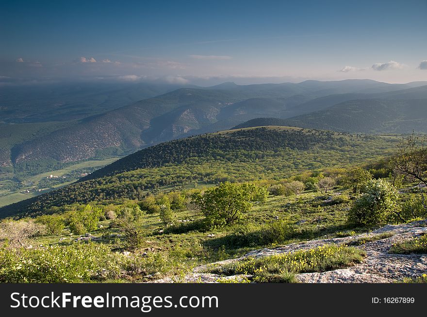 Mountain landscape with view of dramatic sunset