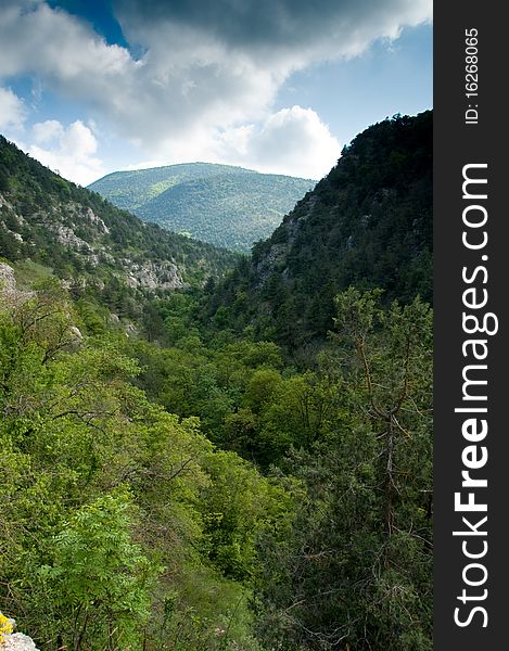 Mountain landscape with view of dramatic sunset