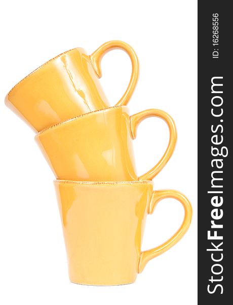 Three Stacked Ceramic Orange Coffee Mugs. Three Stacked Ceramic Orange Coffee Mugs