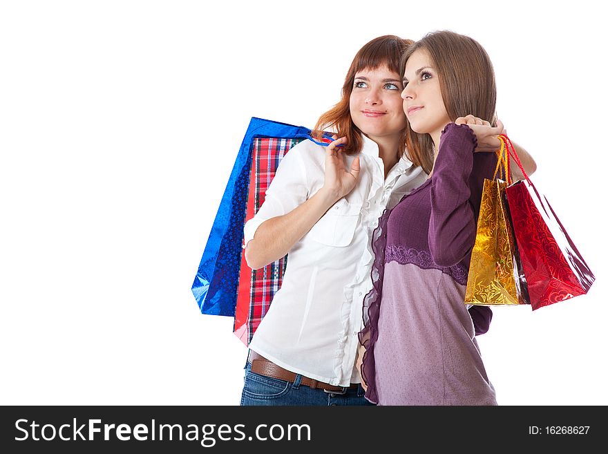 Two teen girls with bags. Isolated on white background