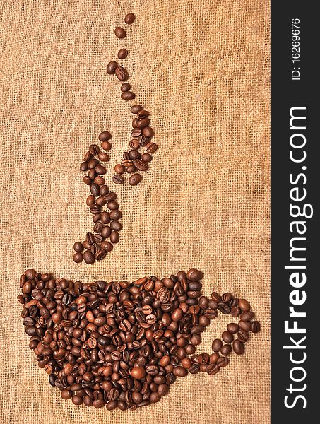 Coffee beans on textile background