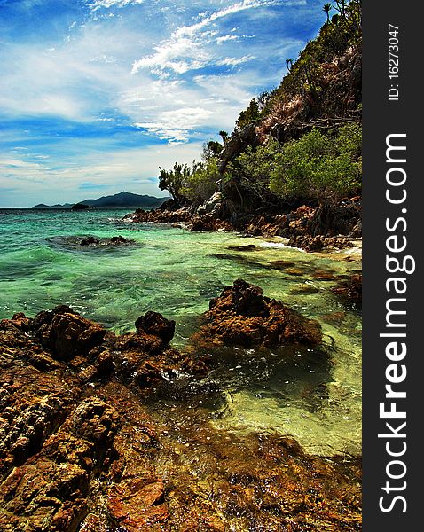 The sky, the rocks, the sand, and the water make malcapuya's shoreline such a wonder to behold. The sky, the rocks, the sand, and the water make malcapuya's shoreline such a wonder to behold.