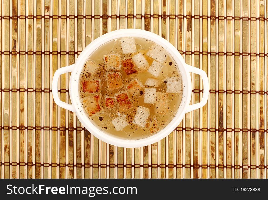 Chicken broth with crackers