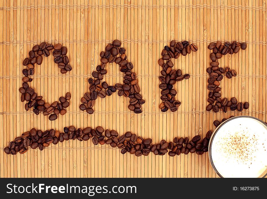 Series. coffee-beens on bamboo background. Series. coffee-beens on bamboo background