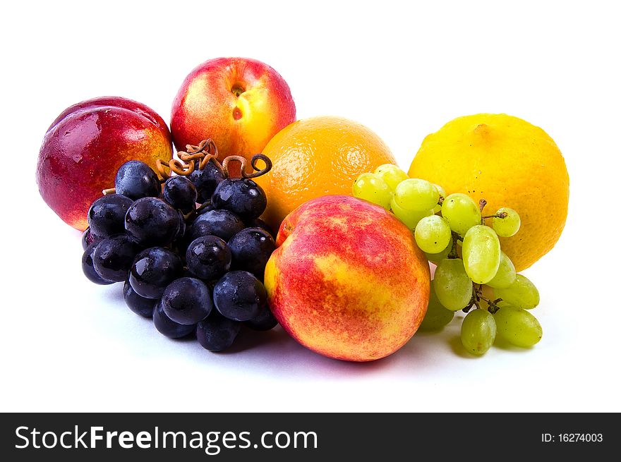 Lemon orange grape nectarine isolated