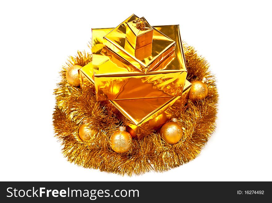 Yellow gifts boxes with christmas balls. Isolated on white. Yellow gifts boxes with christmas balls. Isolated on white