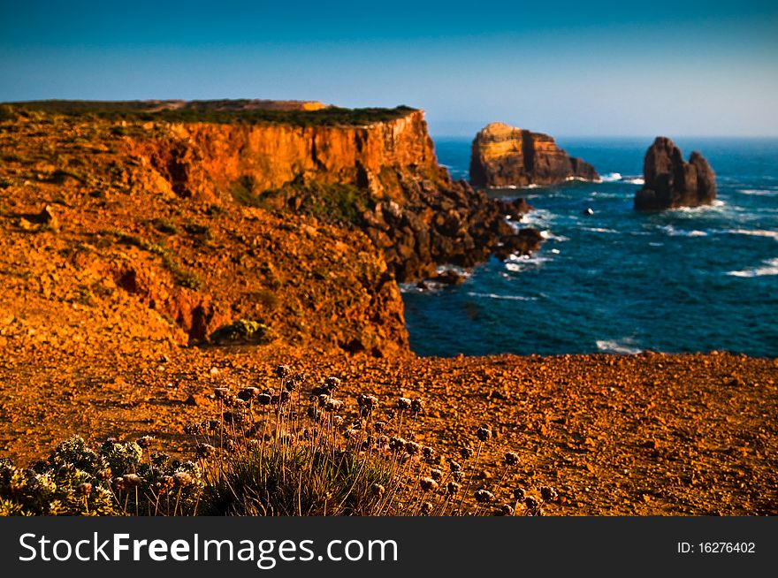 Colourful coastline view from cliff side with blue sea and sky. Colourful coastline view from cliff side with blue sea and sky