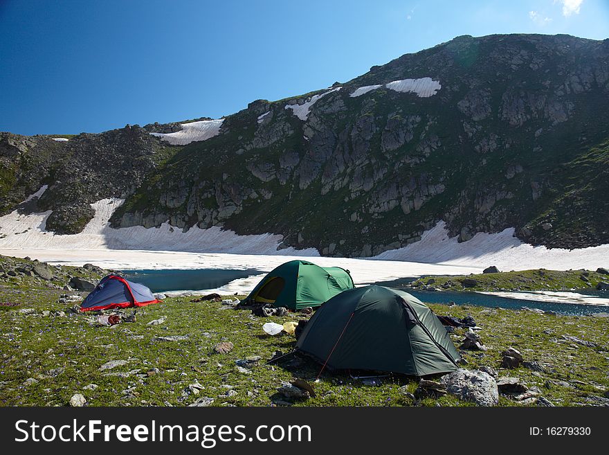 Camp in the mountains near of the lake. Camp in the mountains near of the lake