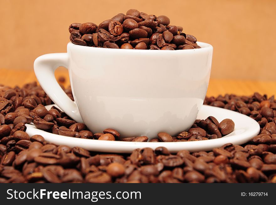 Cup Full Of Coffee Beans