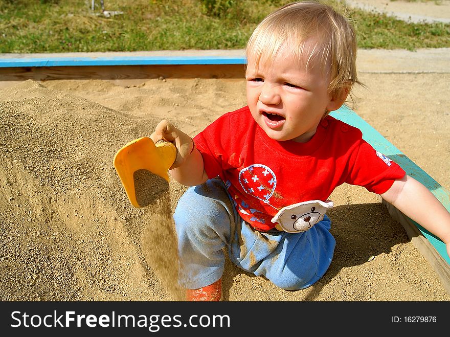 The Boy In A Sandbox