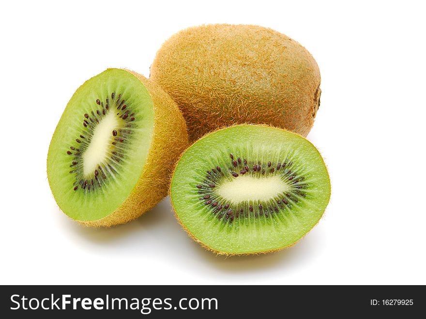 Three fresh kiwi fruit on white background. Three fresh kiwi fruit on white background