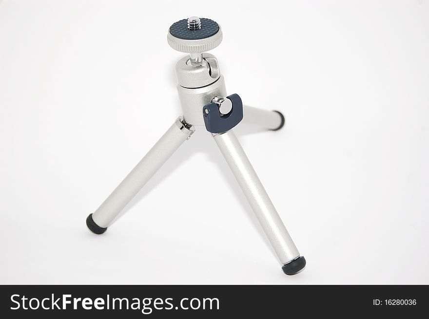 Studio shot of mini camera tripod. Studio shot of mini camera tripod.