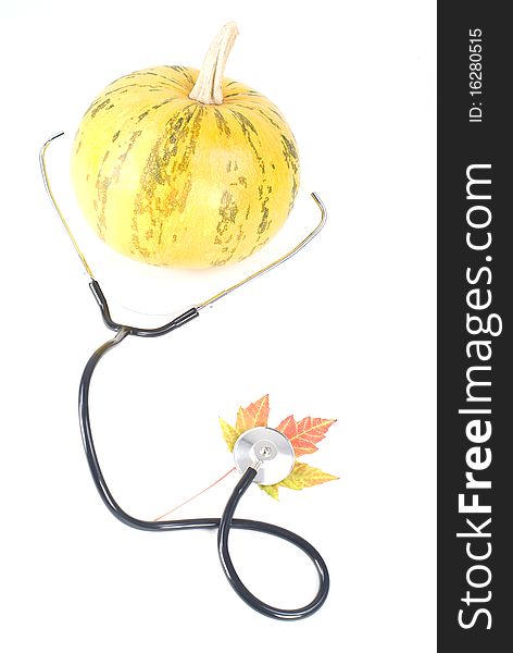 Pumpkin and leaf with stethoscope