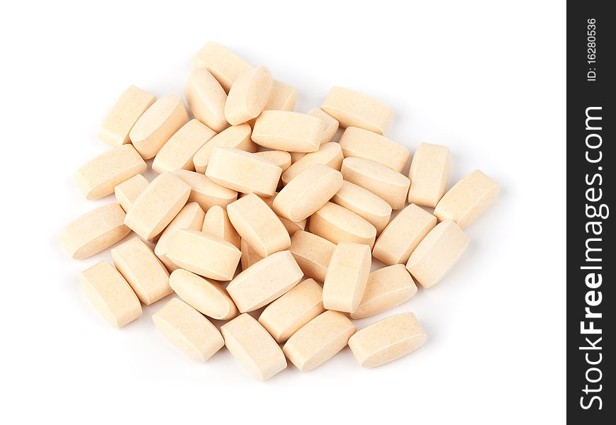 Heap of tablets isolated on a white