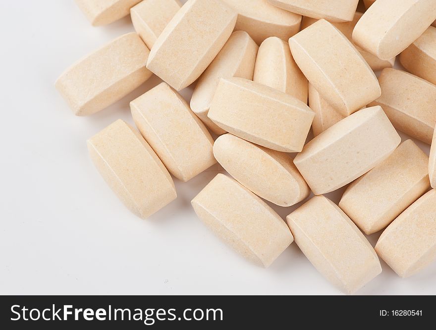 Pile of protein tablets closeup