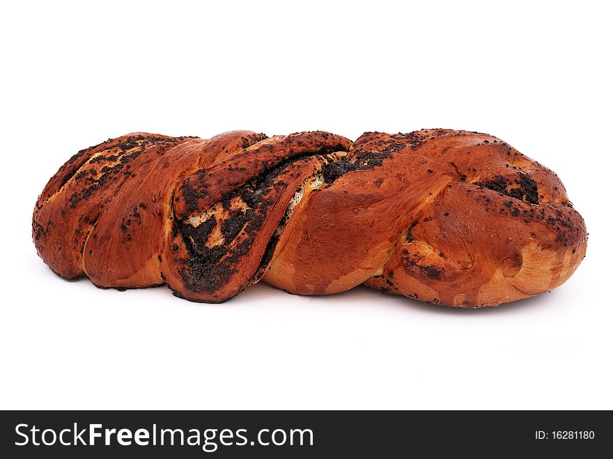 Bun with poppy seeds on a white background