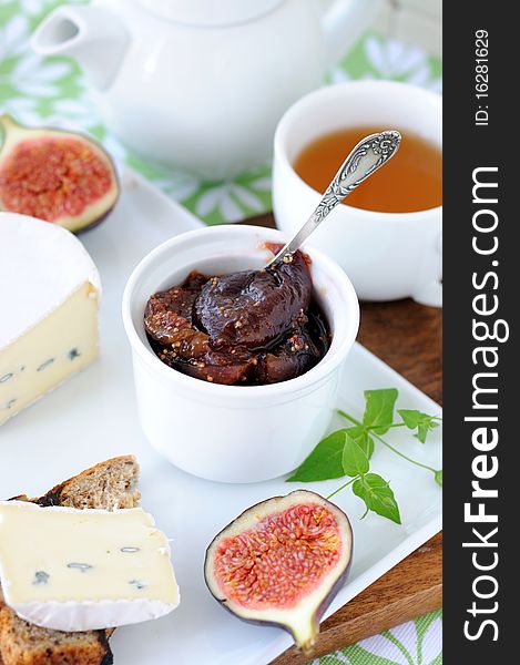 Breakfast with cheese and fig jam.