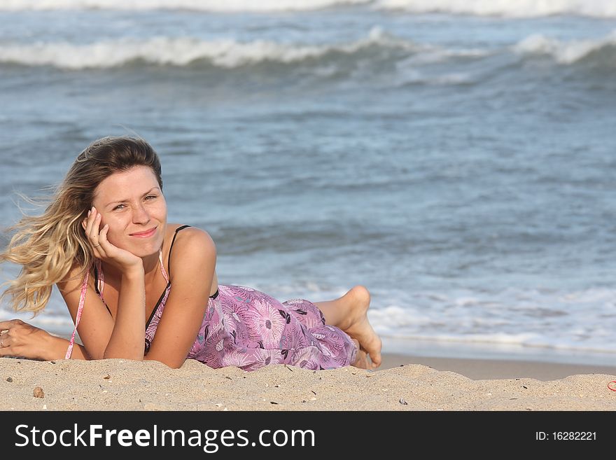 Girl lying on the sand. Girl lying on the sand