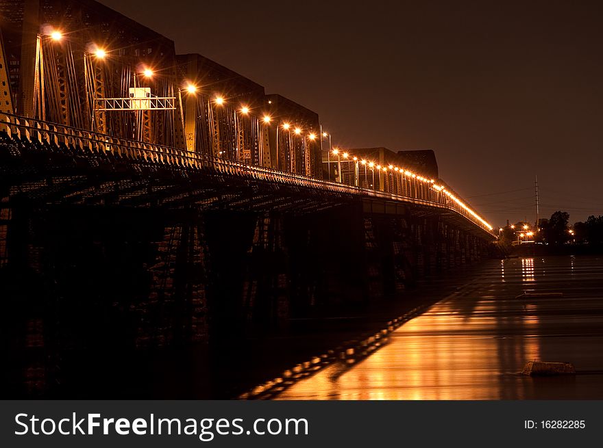 Night shot of the Victoria bridge in Montreal.