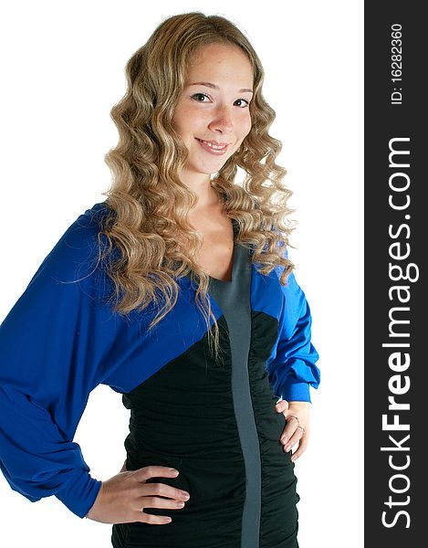 The young beautiful girl in dress of blue and black colors on a white background.