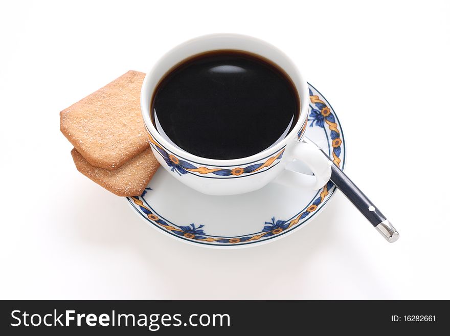 A Cup Of Coffee With Cookies