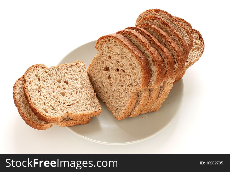 Cereal bread on a gray plate. Cereal bread on a gray plate