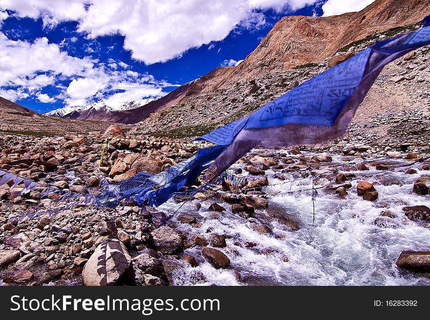 Holy flag of tibetan nearby the river