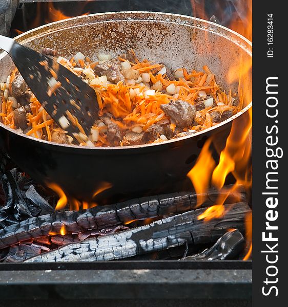 Cooking mutton on open fire. Cooking mutton on open fire