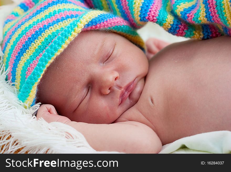 Baby sleeps on the towel