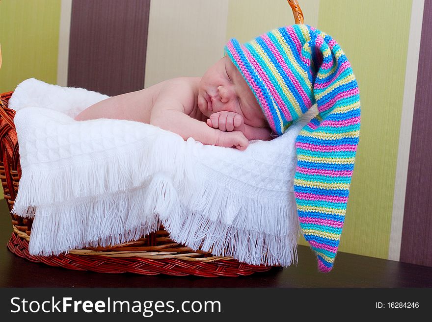 Baby sleeps in the basket