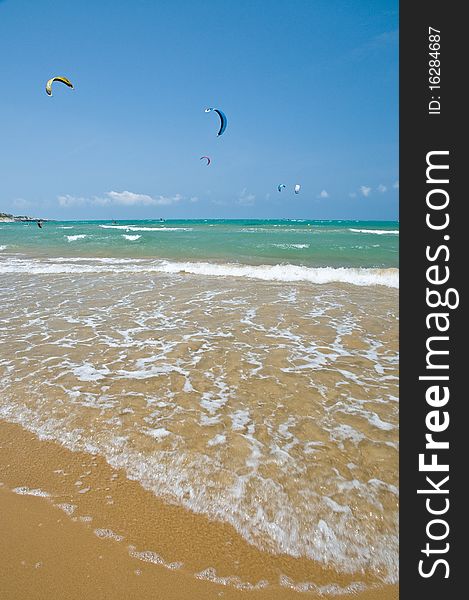 Kitesurfer kiteboarder in the sea by strong wind