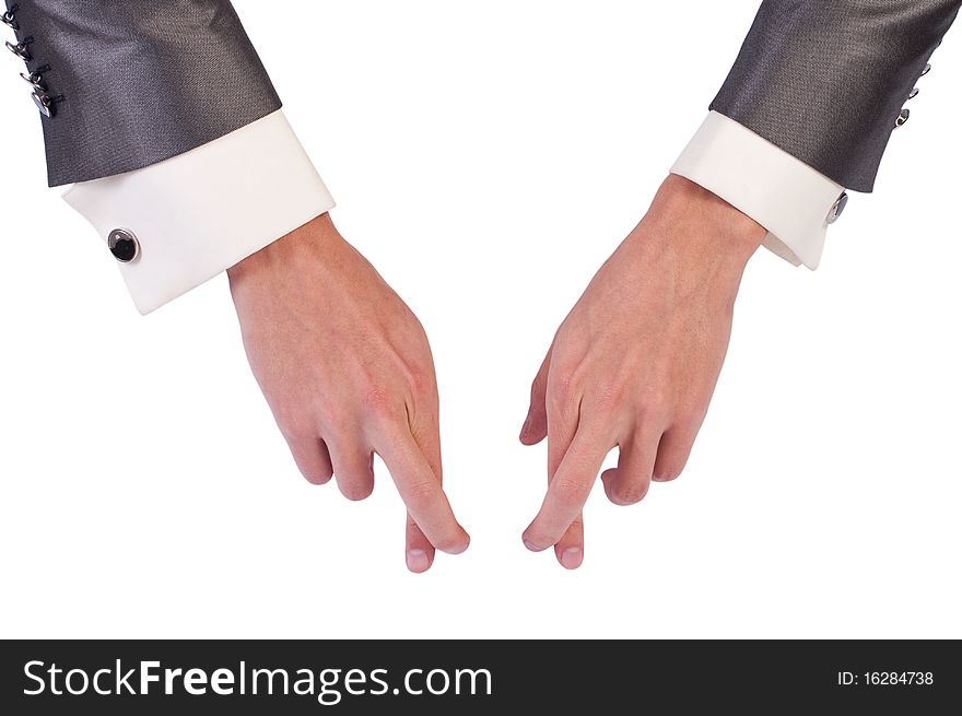 Isolated on white businessman's hands in suit with crossed fingers. Isolated on white businessman's hands in suit with crossed fingers