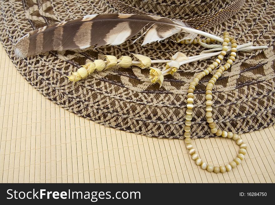Background with lady's hat, feather and beads. Background with lady's hat, feather and beads