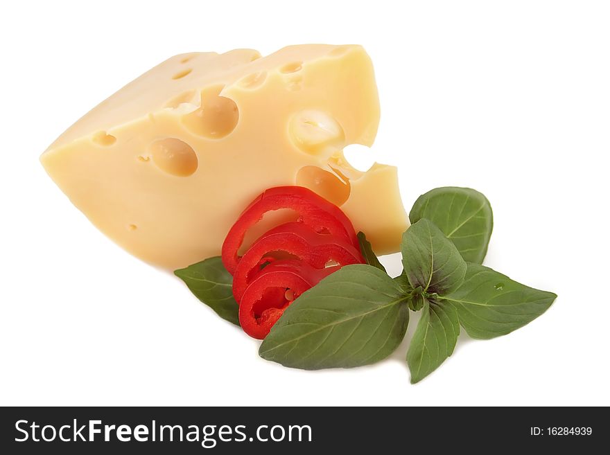 Delicious cheese, red pepper and basil on white background. Delicious cheese, red pepper and basil on white background