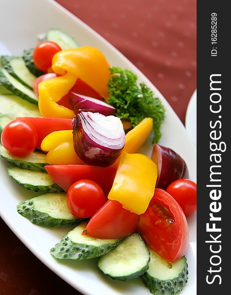 Cut fresh colorful vegetables as an appetizer. Cut fresh colorful vegetables as an appetizer