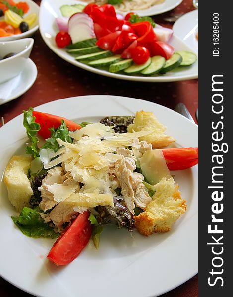 Fresh delicious appetizer. Cheese, meat with vegetables. Fresh delicious appetizer. Cheese, meat with vegetables
