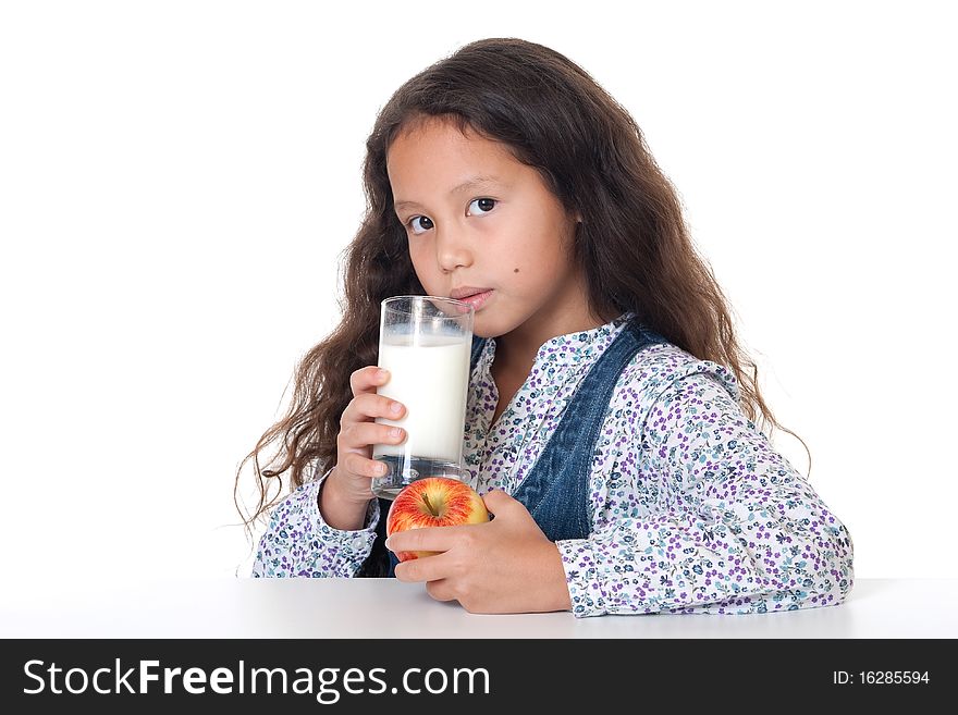 Healthy eating, portrait of girl with apple and milk against white background