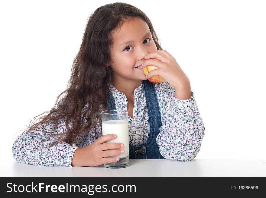 Healthy eating, portrait of girl with apple and milk against white background