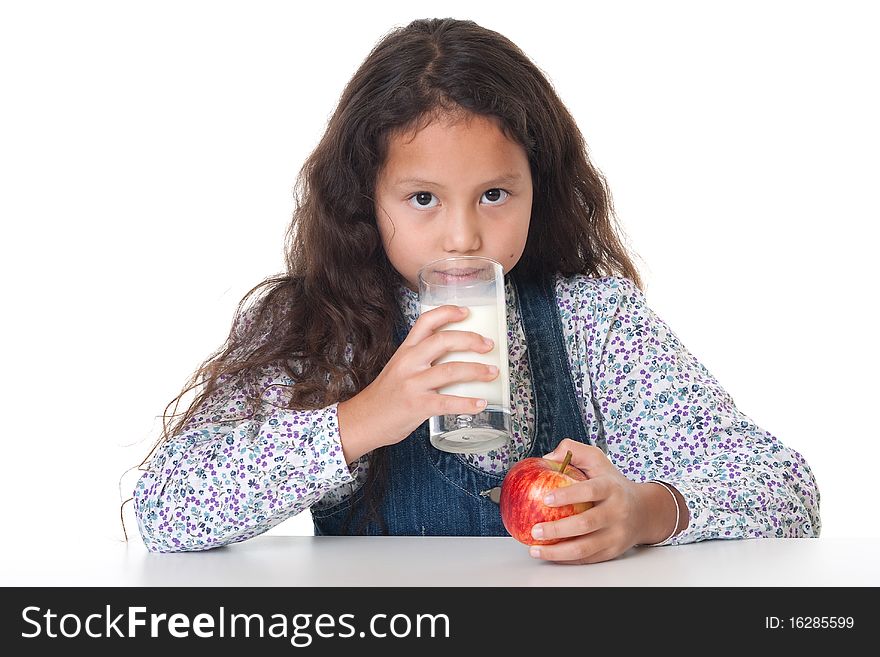 Healthy eating, portrait of girl with apple and milk against white background