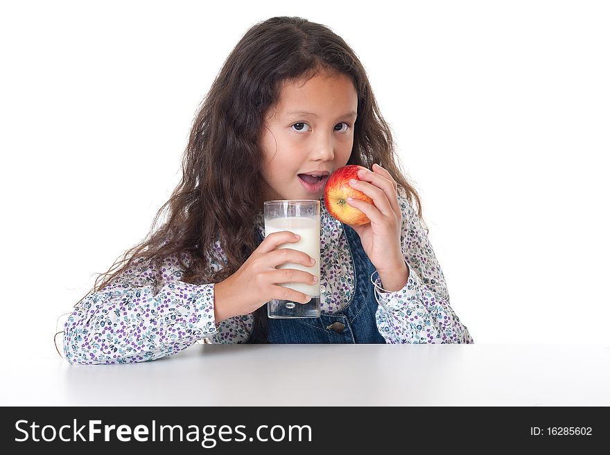 Healthy eating, portrait of girl with apple and milk against white background