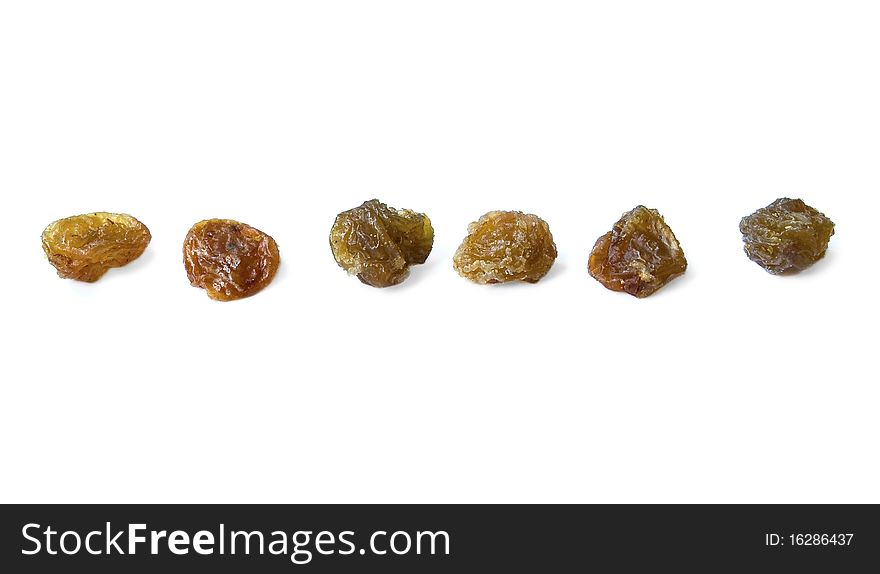 Rank of raisins isolated over white background
