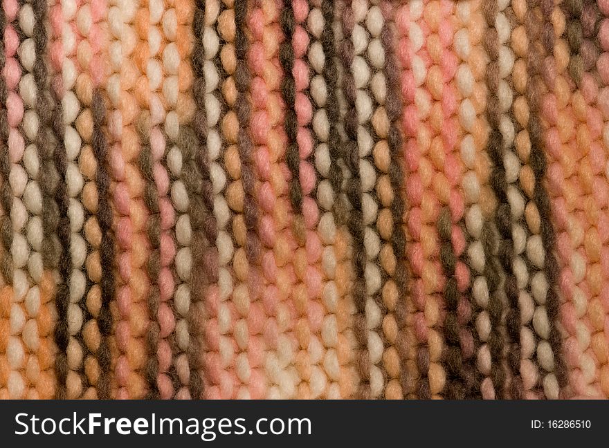 Pink knitted stripped textured background. Pink knitted stripped textured background