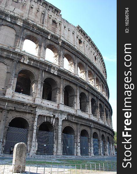 Image of the Coliseum, roman Colosseum, the most famous amphitheatre around the world. It is in the center of the city of Rome. It has been estimated than about 500.000 people and over a million wild animals died in the Colosseum games.