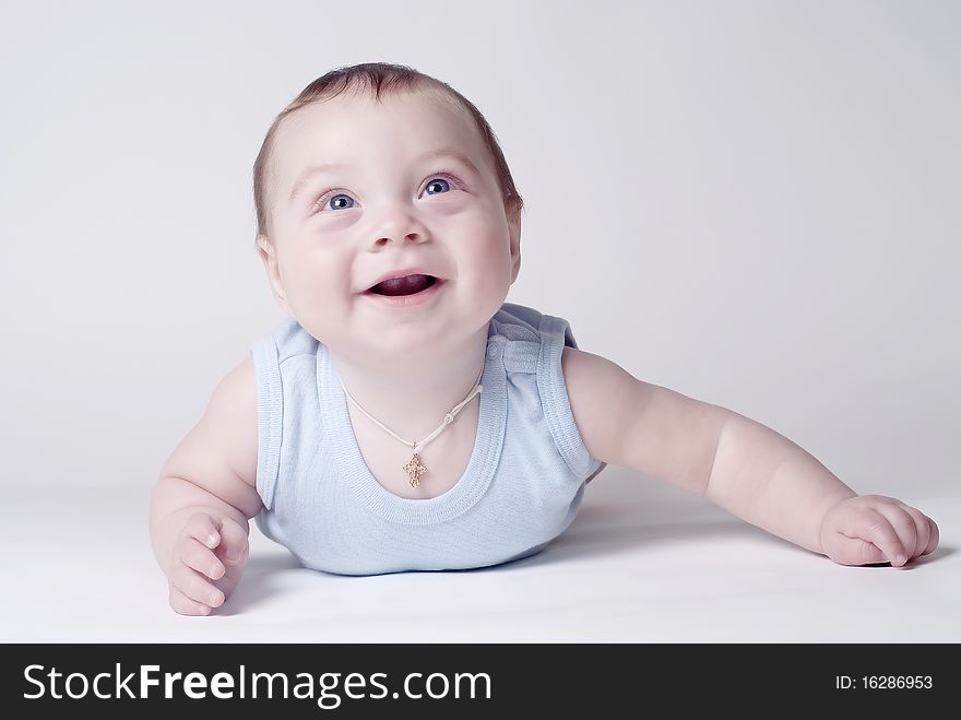 Happy baby crawl on a white background