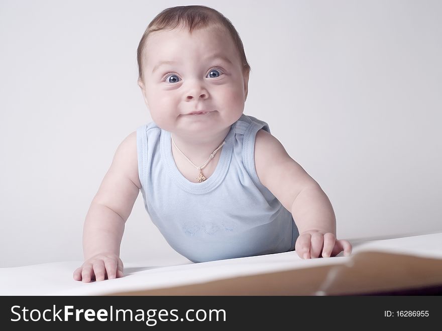 Happy baby  on a white background