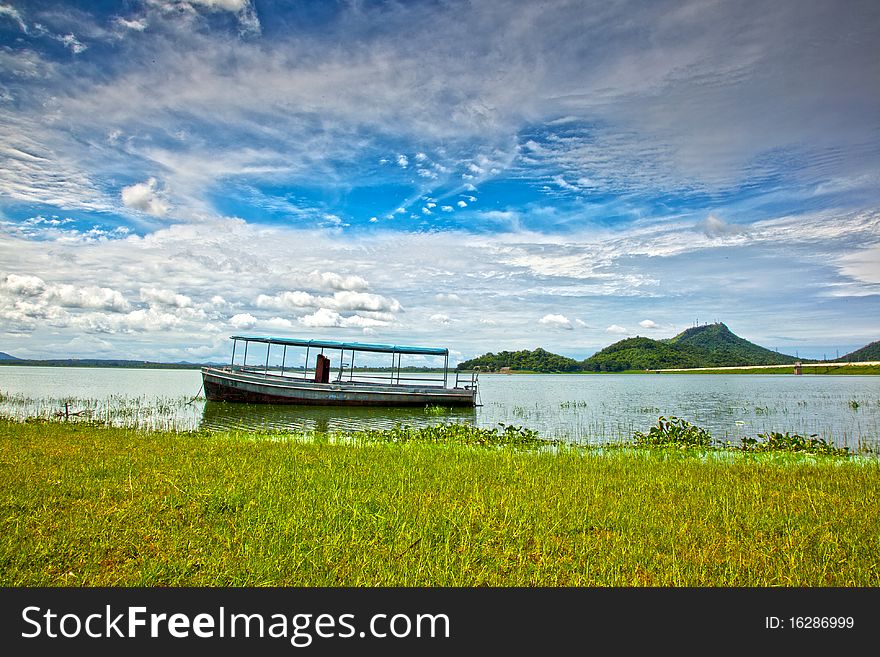 The vintage boat on the lake