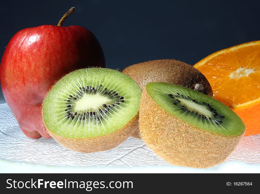 All fruit, apple kiwis and orange