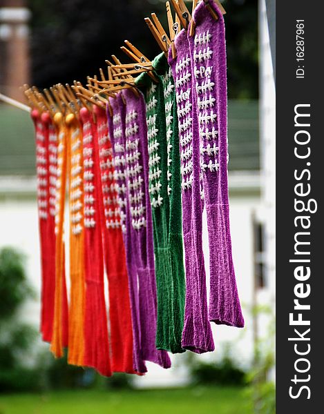 Colorful socks hanging on a clothesline. Colorful socks hanging on a clothesline